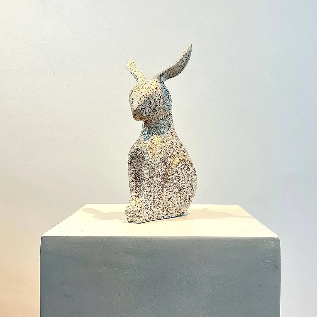 Stonebound Serenity: Abstract Rabbit Sculpture