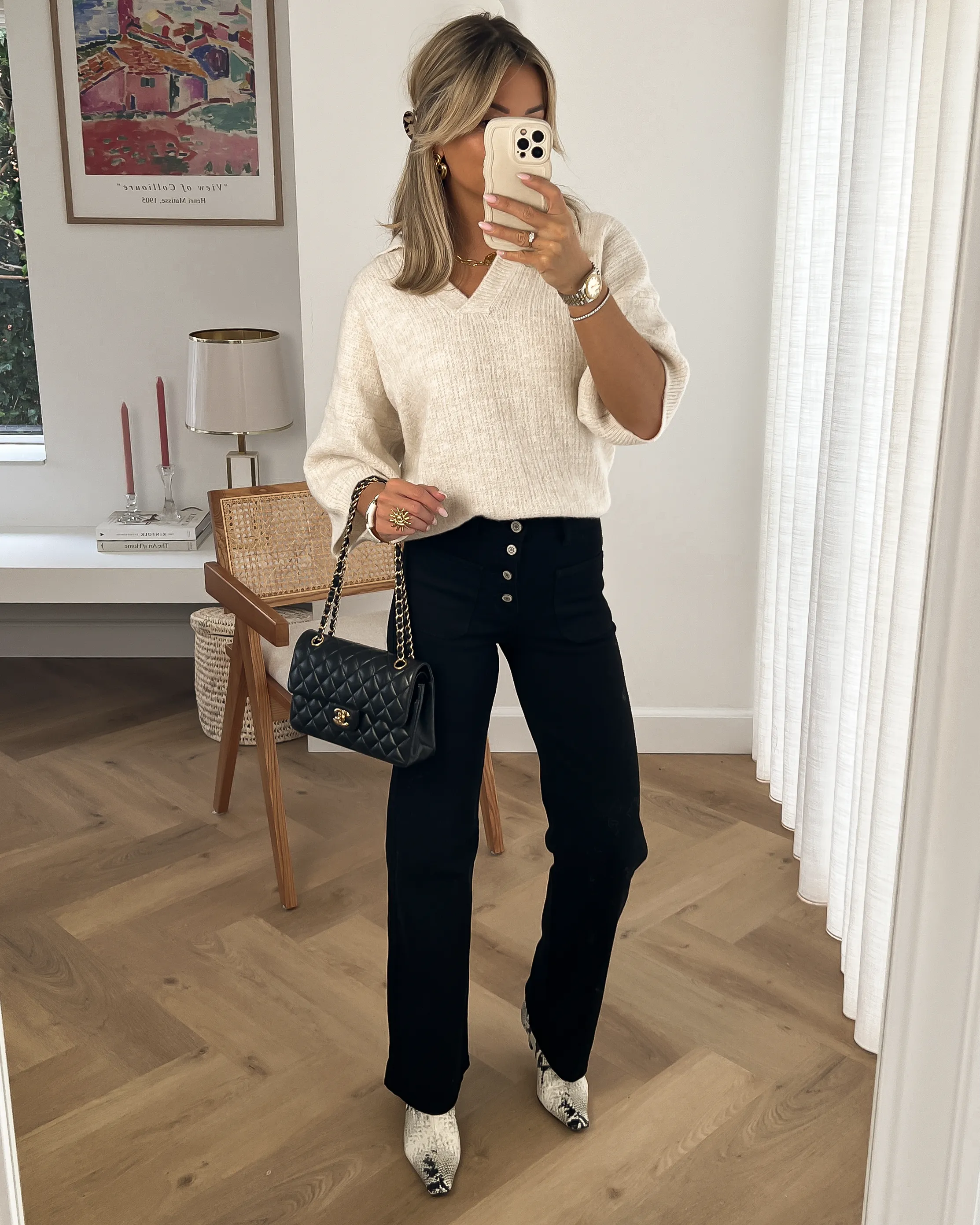 Black Button Flare Jeans by Valerie