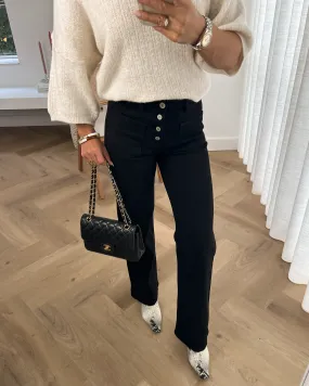 Black Button Flare Jeans by Valerie